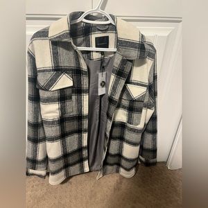 Plaid shacket with tags still on. It’s oversized size xxs